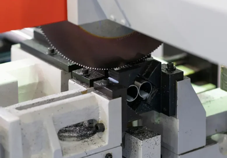 Circular Saw Cutting A Steel Bar With Automatic Feed — Hire Pro In Mudgeeraba, QLD