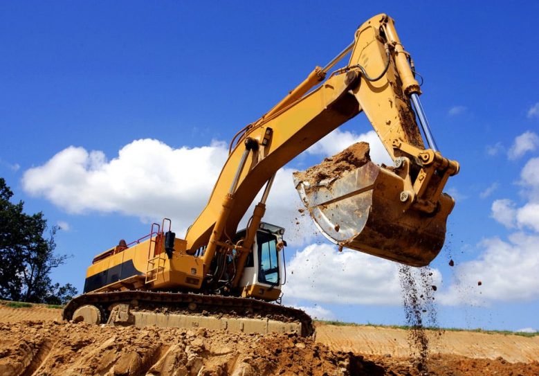 A Yellow Excavator At Work — Hire Pro In Mudgeeraba, QLD