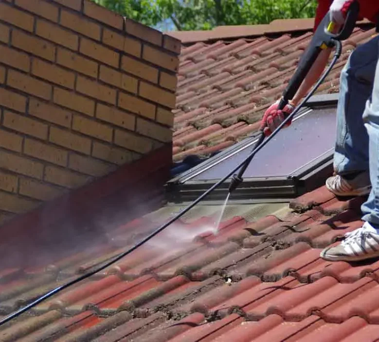 House Roof Cleaning Using A High-Pressure Washer — Hire Pro In Mudgeeraba, QLD